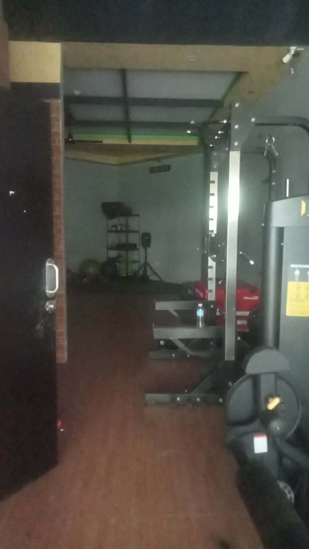 Interior of the same fitted unit in use as a gym
