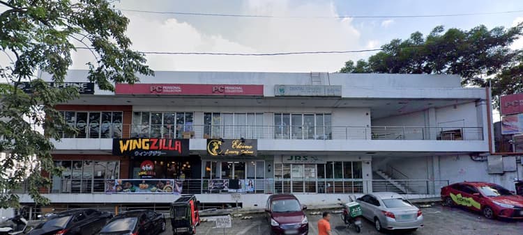 Eleve Town Center, the two-storey commercial building along Camarin Street with ground and upper-floor retail units